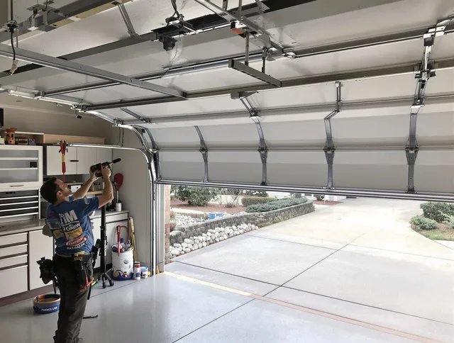 Garage door track repair service by Concord Garage Door Repair in Concord
